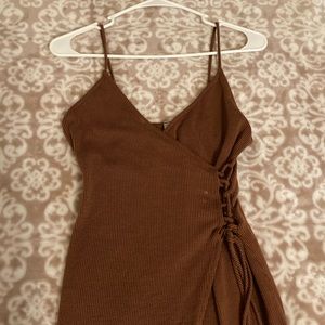 brown/burnt orange ribbed dress.